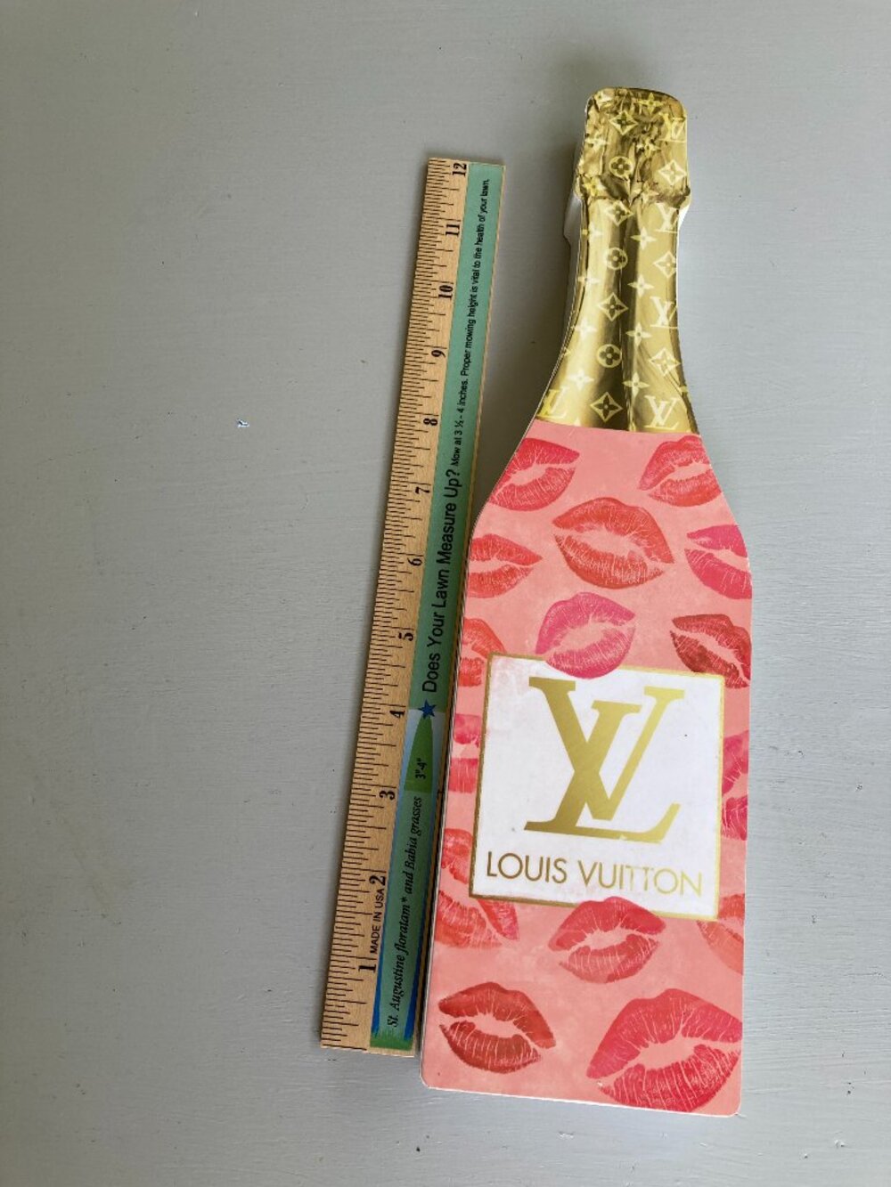 LOUIS VUITTON ART WALL PLAQUE  CHAMPAGNE BOTTLE 13"LX3.5"W 1" Depth.